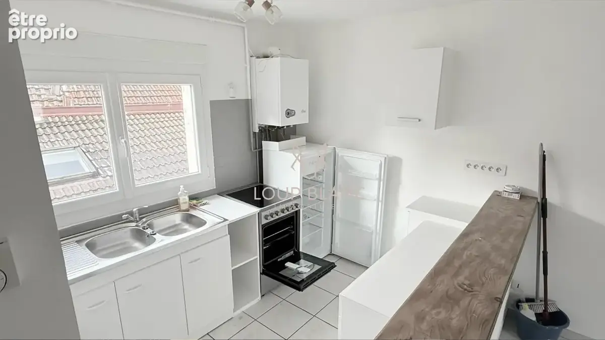 Appartement loué avec garage en plein centre d'Héricourt   Investissement locatif idéal - photo 2