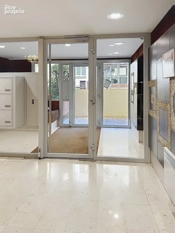 Appartement traversant de 137 m2 ascenseur, balcon terrasse, cave et box - photo 16