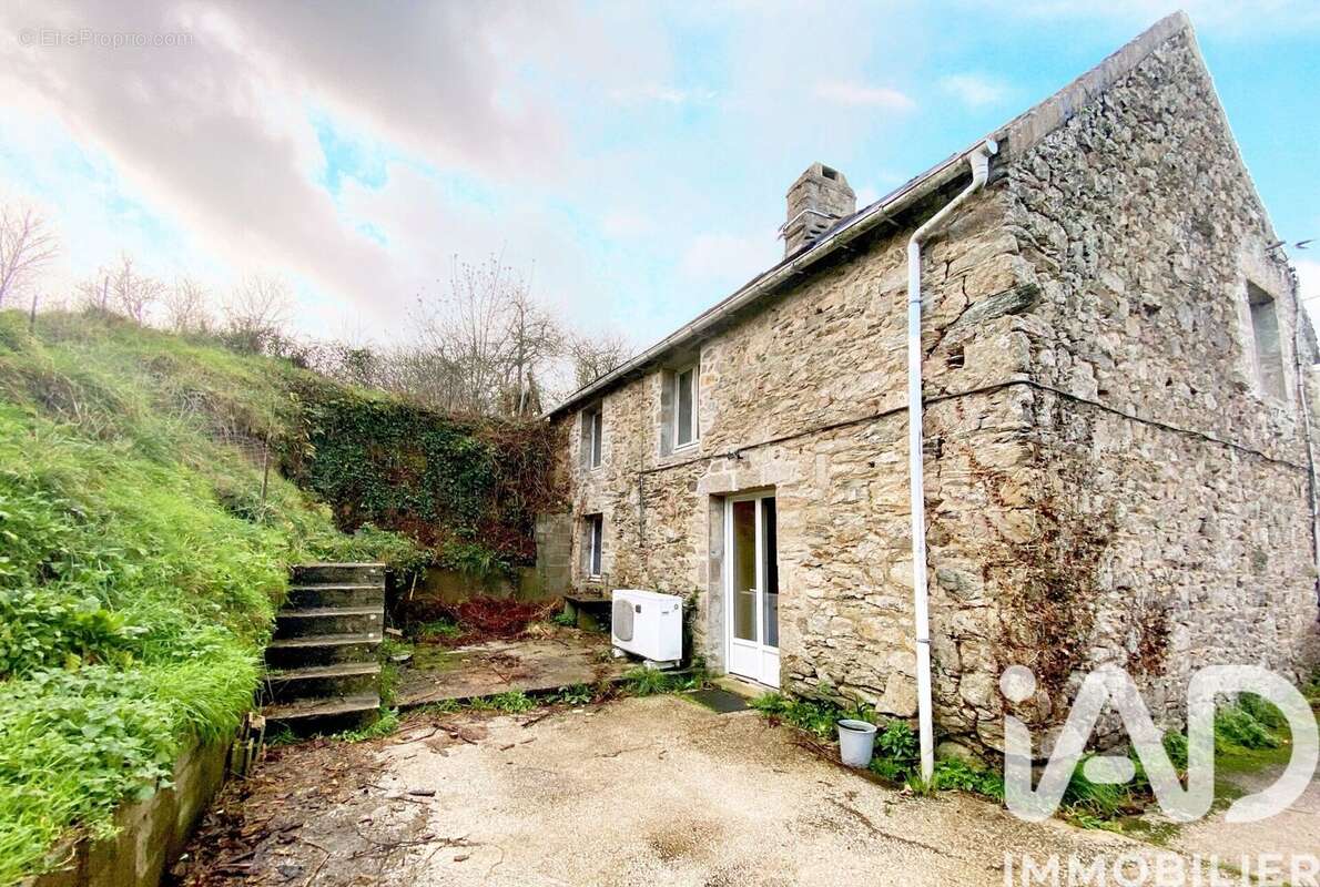 Photo 2 - Maison à URVILLE-NACQUEVILLE