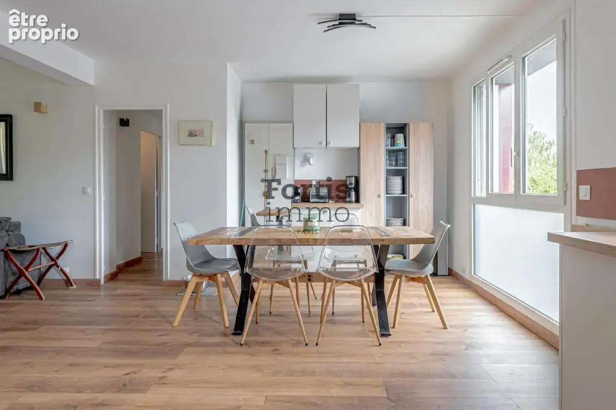 Saint-denis - appartement rénové avec balcon plein sud - photo 4