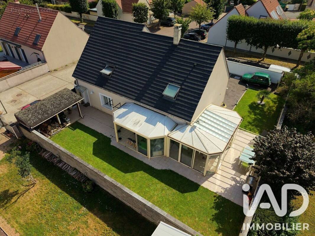 Photo 1 - Maison à LIEUSAINT