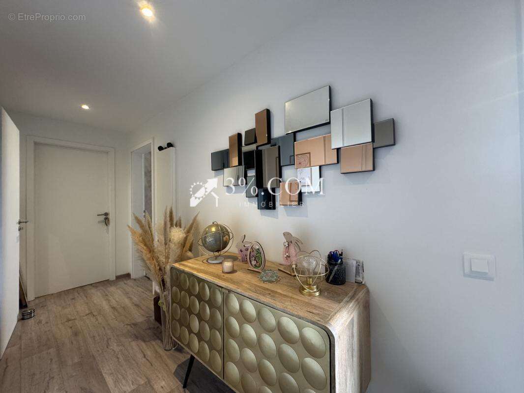3%COM beau F3 avec terrasse et 2 places de parking- cave - photo 13