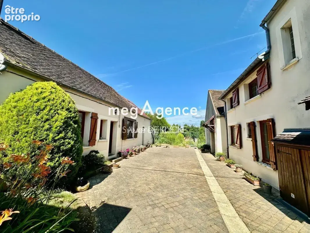 Ensemble de deux maisons avec jardin de 565m2 - photo 4