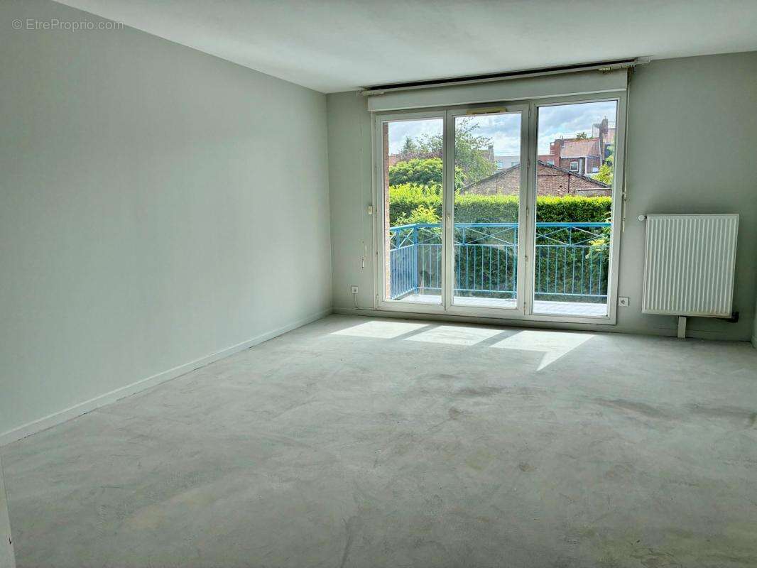 Centre ville t4 78m²  avec grand balcon et parking en carport - photo 2