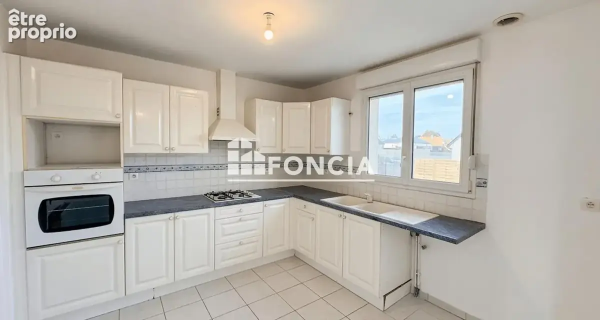 Maison de plain-pied de 100 m² - 3 chambres - photo 2