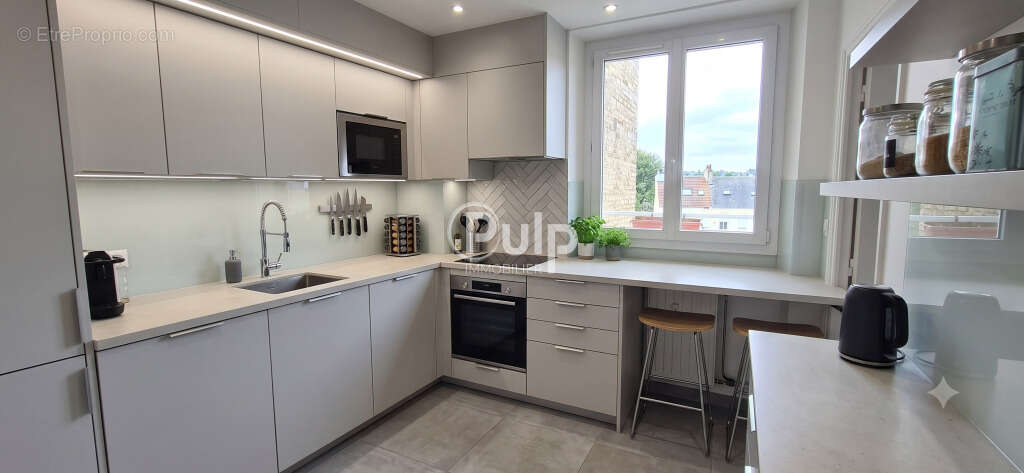 Boulogne-sur-mer - bel appartement traversant de 80 m² avec parking privatif & cave - photo 4