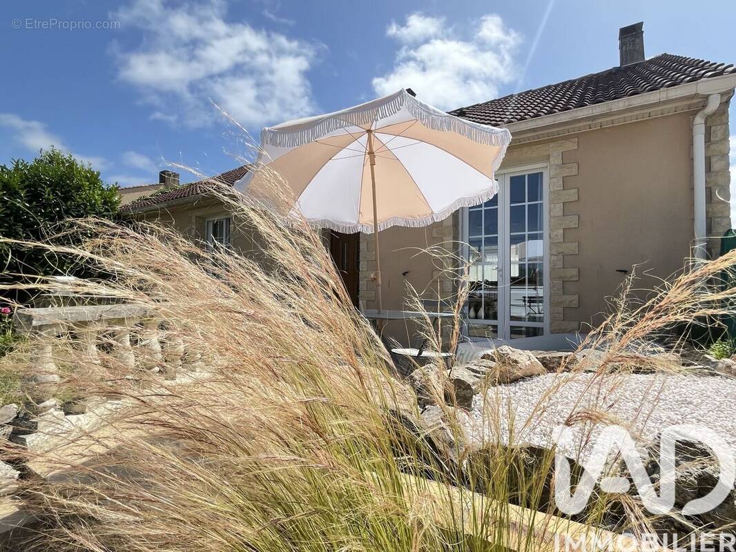 Photo 1 - Maison à BOUGUENAIS