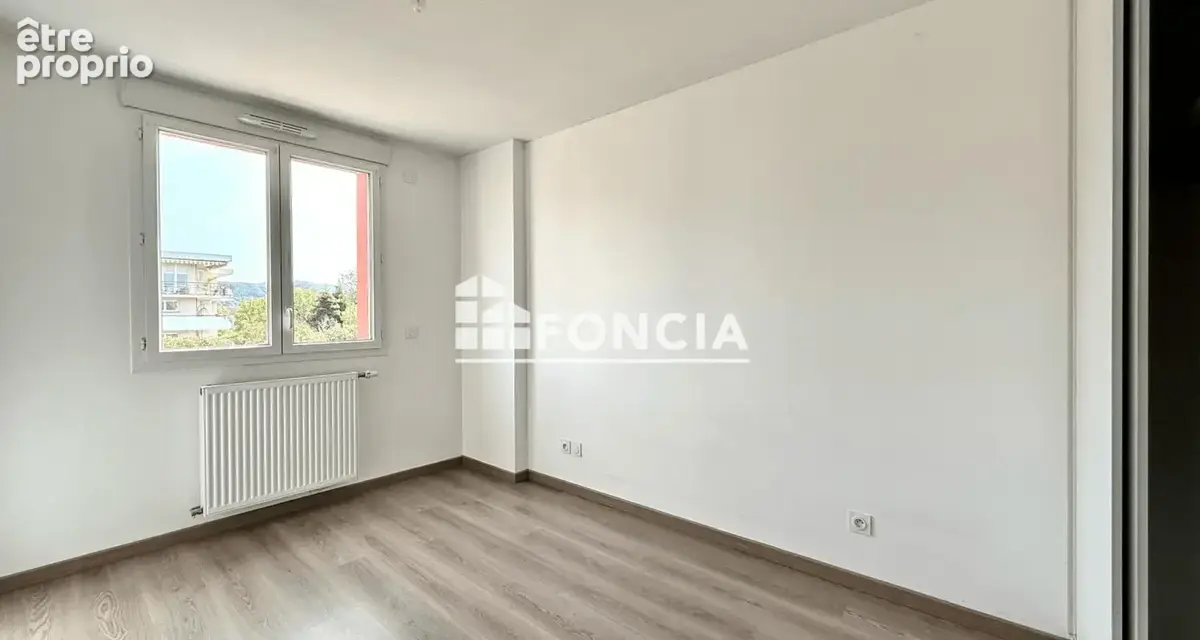Appartement T3 avec terrasse et garage - photo 8