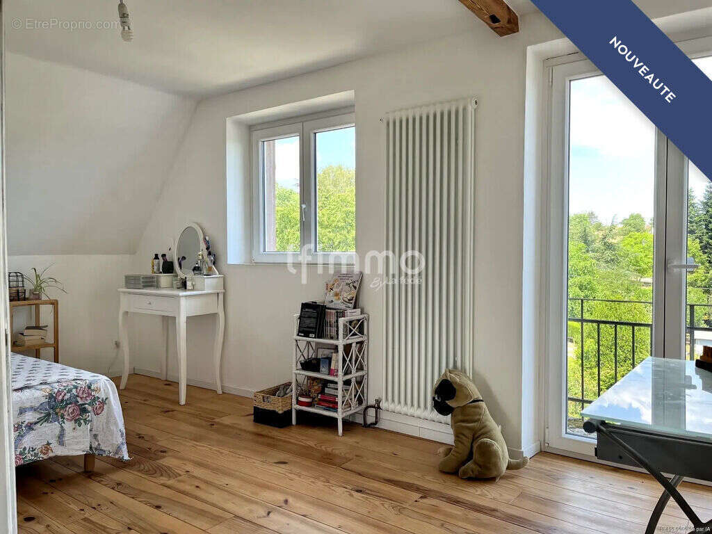 Elégante maison avec deux appartements et une grange - photo 4