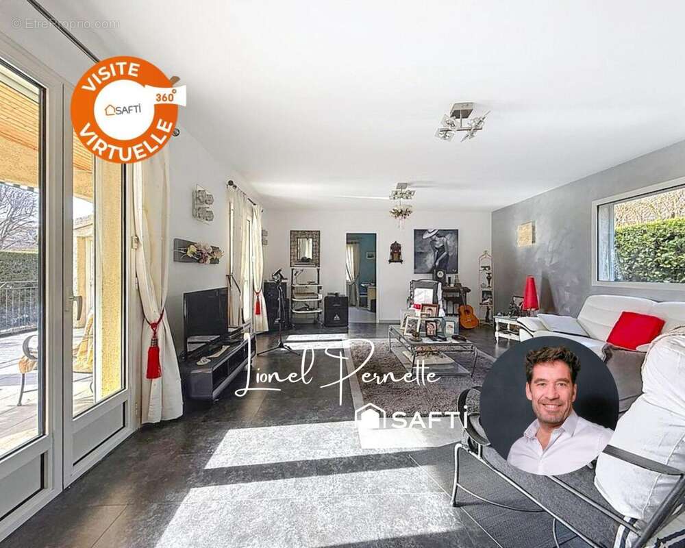 Photo 2 - Maison à GENISSIEUX