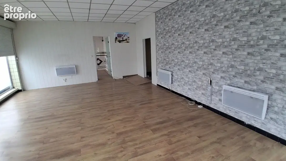 ENSEMBLE IMMOBILIER ( Local commercial + maison + appartement + garage ) - photo 3