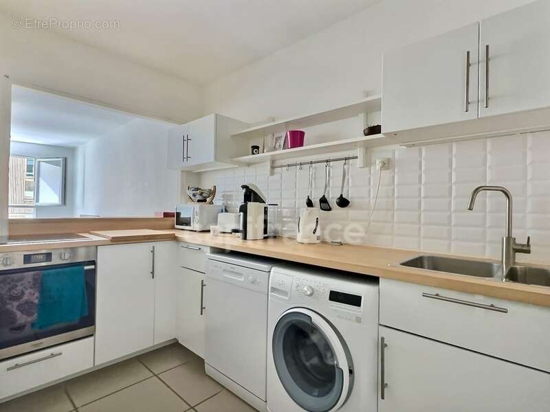 Appartement à vendre 2 pièces 48,70 m² PARIS 20EME ARRONDISSEMENT (75) en excellent état au sein d'une résidence standing - photo 7