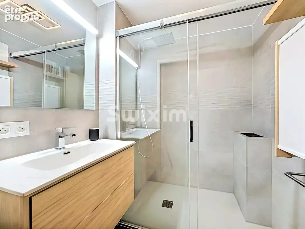 T4 Traversant de 86m² avec vue sur le lac – Garage, Cave et 3 Balcons - photo 4