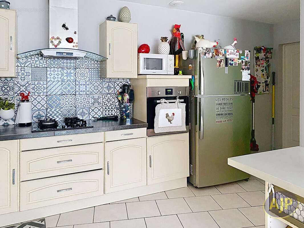 Maison fonctionnelle avec sous-sol aménagé et vue imprenable - photo 6