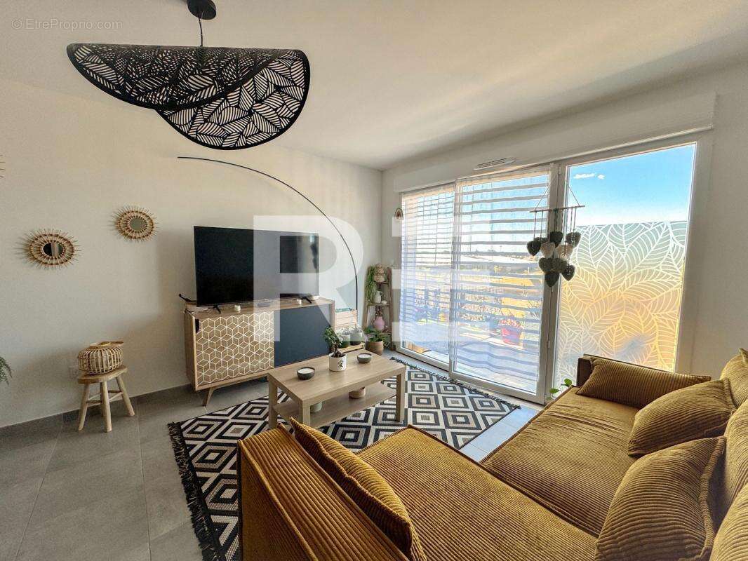 Appartement à GARONS