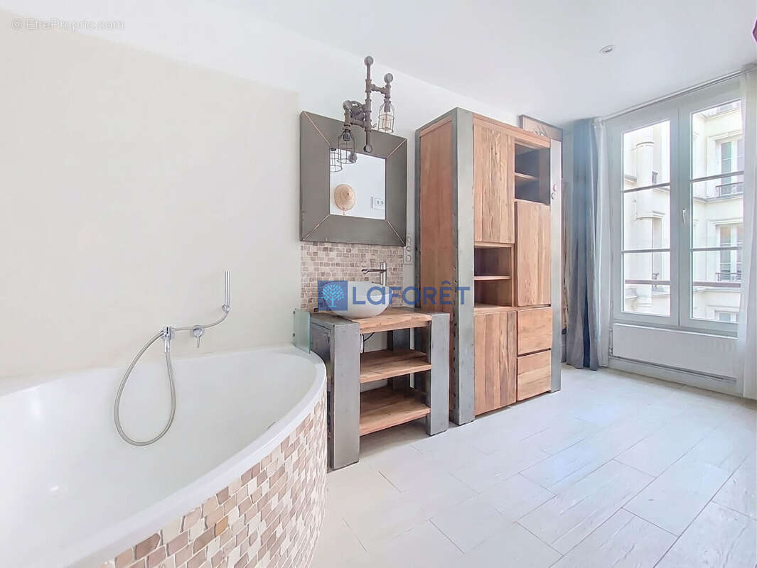Appartement familial - 4 chambres - Avec ascenseur - photo 12