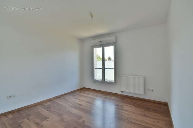 Saint-André-lez-Lille (Quartier Ouest) – T2 de 47 m² avec balcon, ascenseur et parking privatif - photo 8