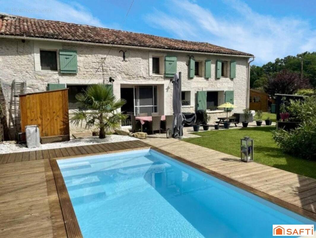 Photo 1 - Maison à BERCLOUX