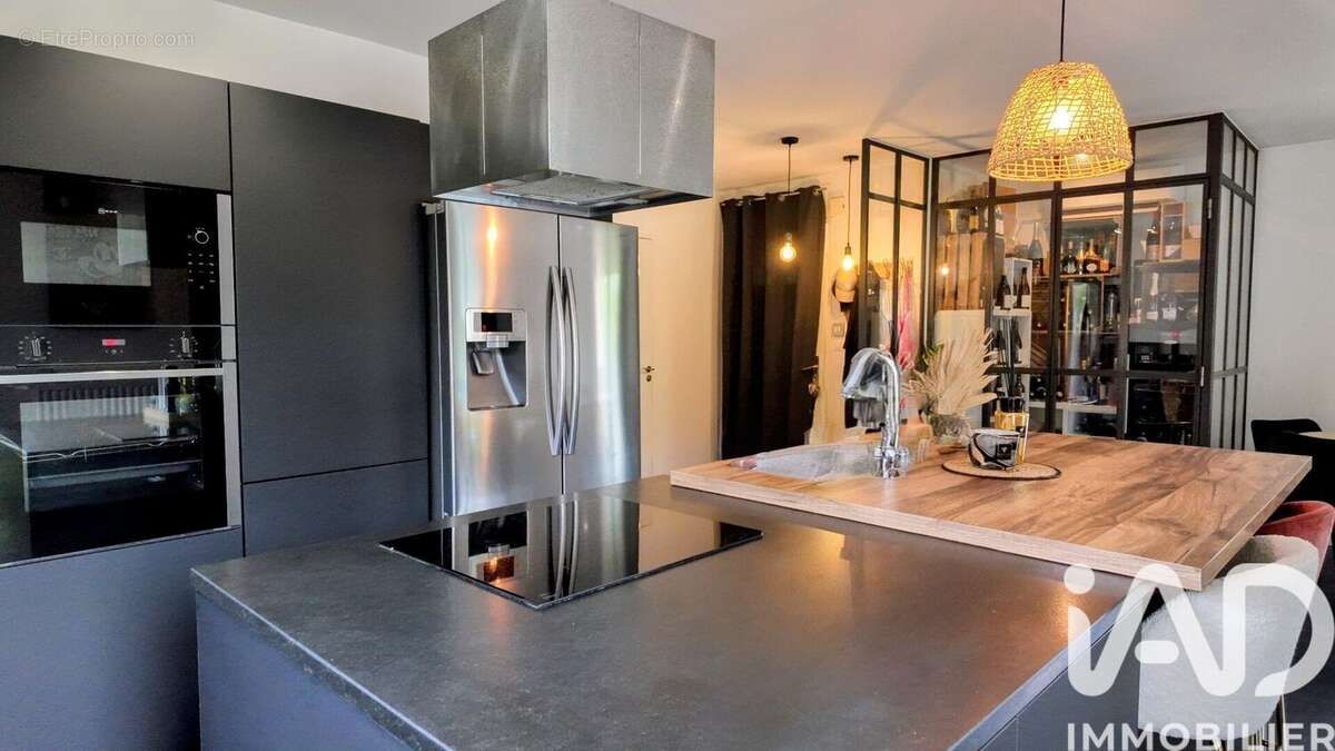 Photo 2 - Maison à ROCHE-LA-MOLIERE