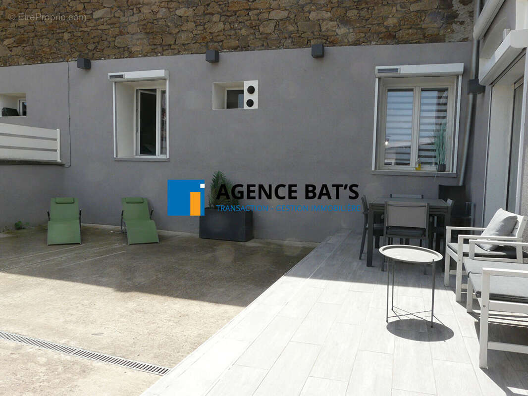 Photo 2 - Appartement à SAINT-GENEST-LERPT