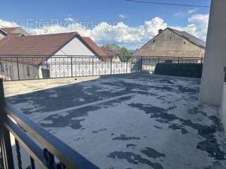 Spacieuse terrasse en hauteur 