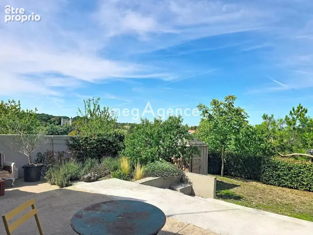 Maison de plain-pied – 148 m² – Grands volumes et vue sur le château - photo 13