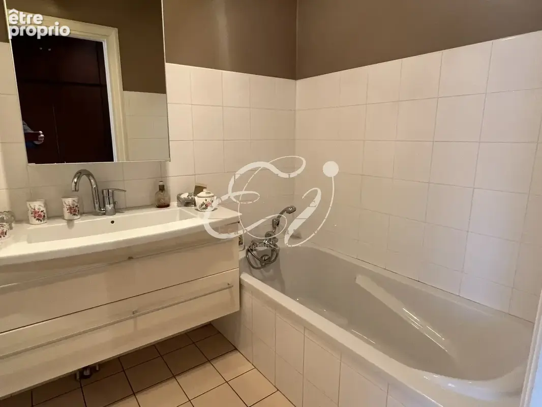 Vente ecully 69130 appartement trois pieces pitance etage eleve garage - photo 6