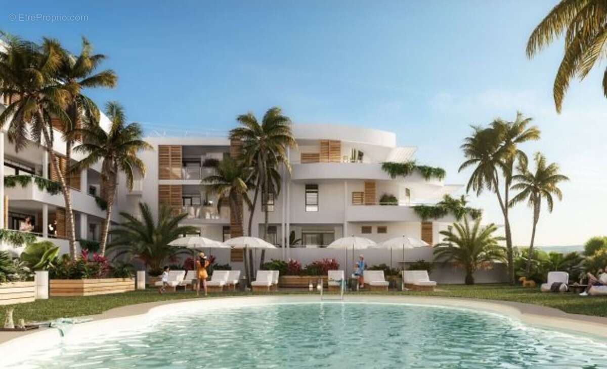 A VENDRE Appartement T2 en R+1 à Sainte-Anne - Vue mer ! - photo 4