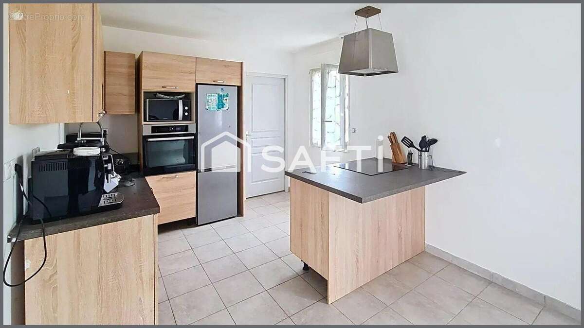 Photo 2 - Maison à ETREPAGNY