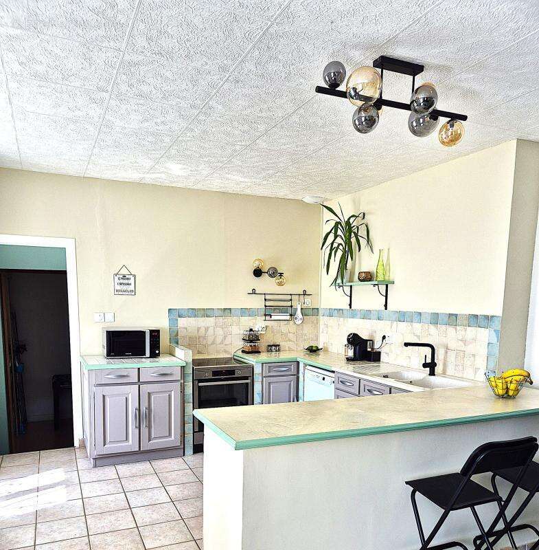 Maison à SAINT-GENIS-LES-OLLIERES