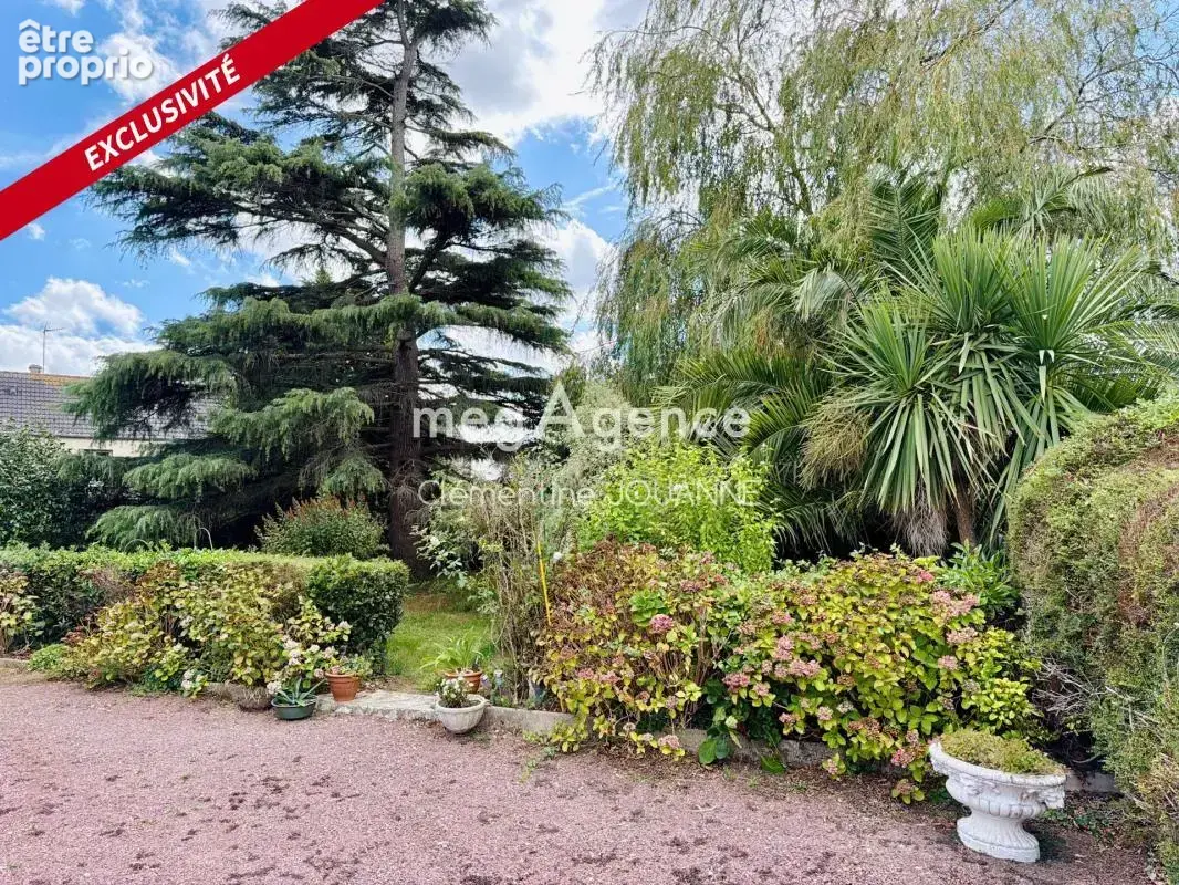 Charmante maison mitoyenne en pierre avec grand jardin arboré et fleuri à deux pas du bourg de Picauville - photo 3