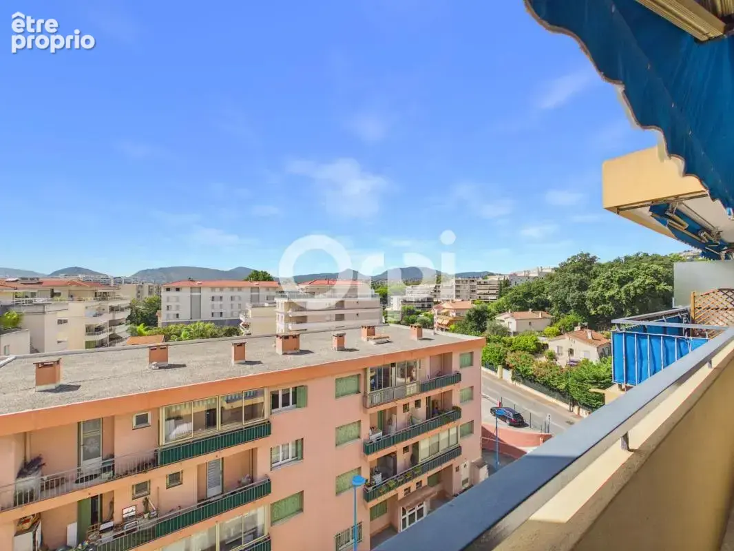 Appartement t3 - 86m2 - stationnement/ cave - centre ville - traversant - dernier étage - photo 14