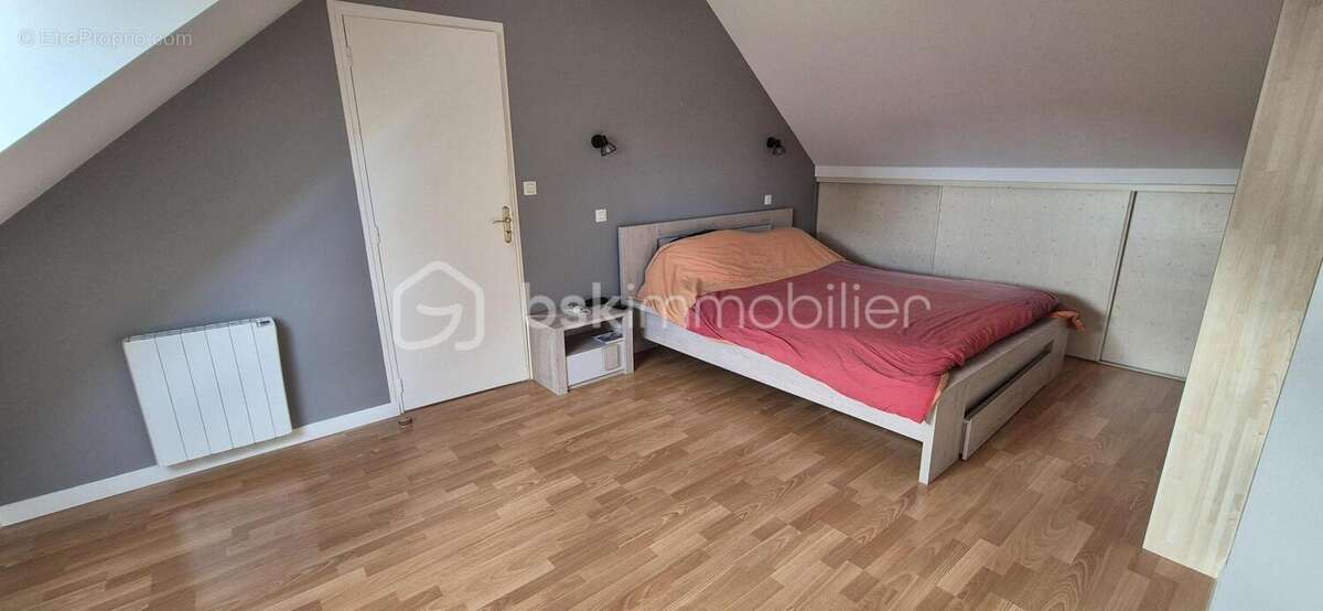 BEAUCÉ – Maison rénovée de 105,48 m² avec vie de plain-pied, sous-sol complet et terrain clos de 492 m² - photo 14