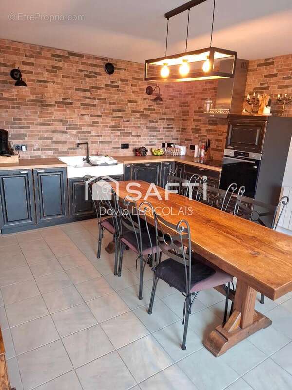 Photo 2 - Maison à SAINT-SAUVEUR-LENDELIN