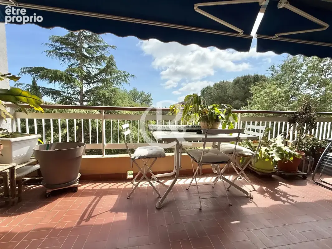 Mediatheque - t3 traversant avec terrasse - photo 2