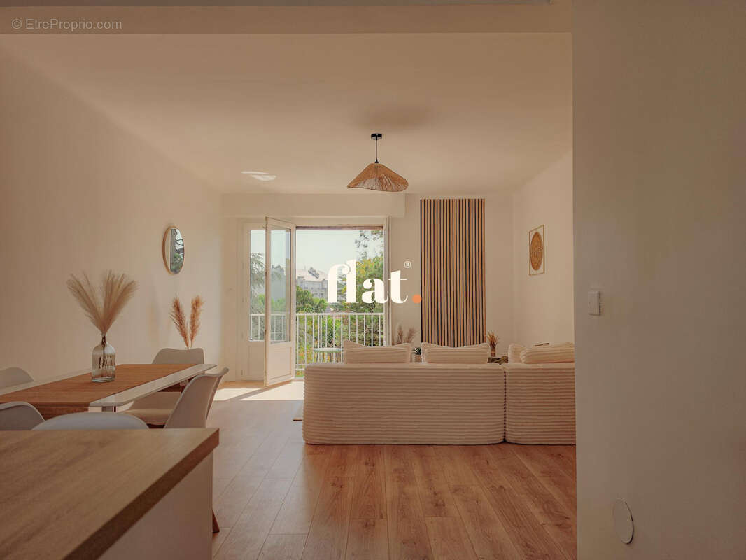 Appartement T3 de 70 m2  - RD POINT DE VANNES - 2 chambres + Cave - photo 32