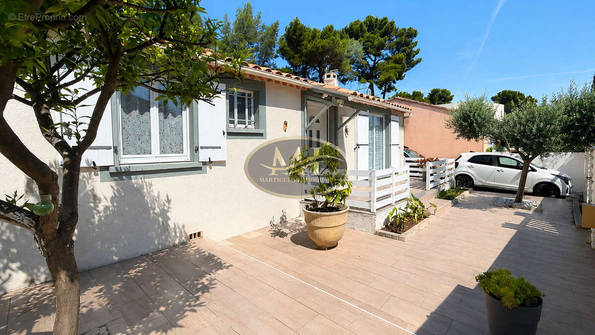 Maison T4 de plain-pied avec garage sur terrain arboré de 586 m2 - photo 2