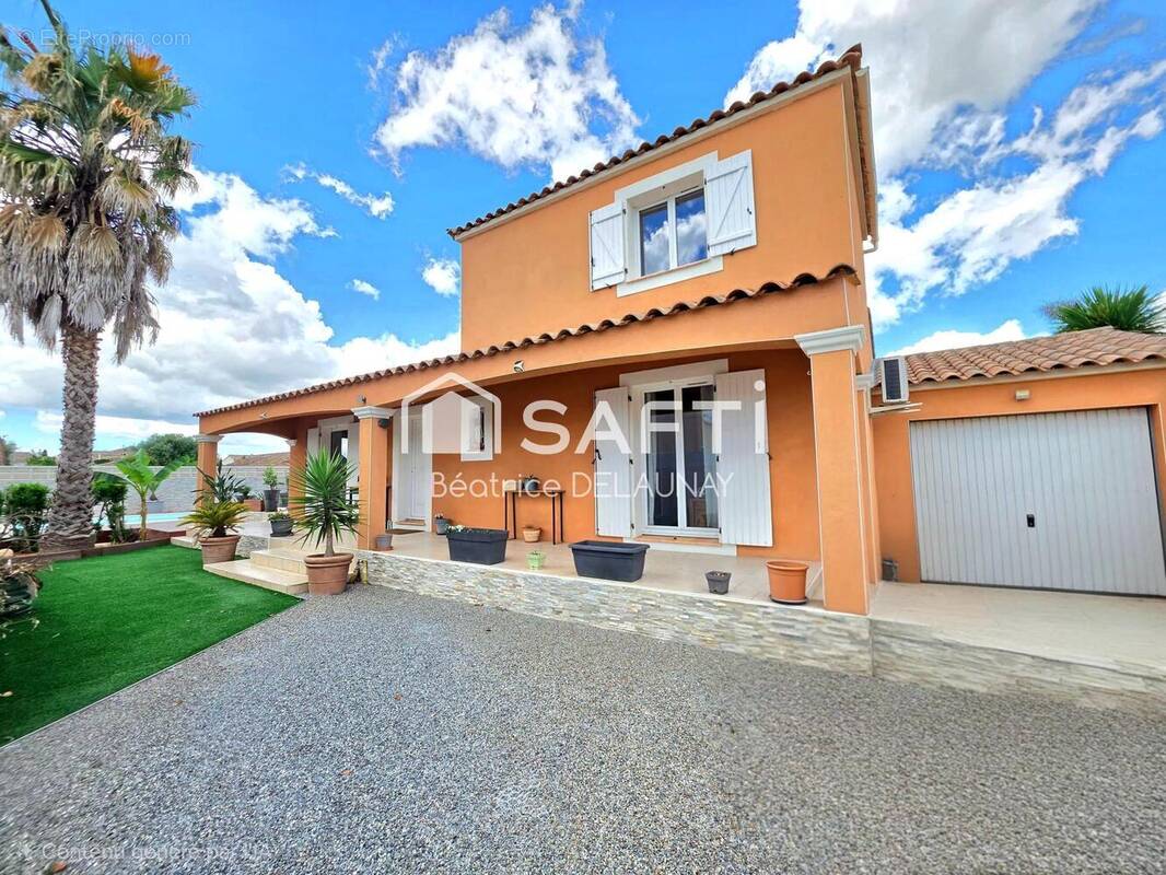 Photo 1 - Maison à SAINT-LAURENT-D'AIGOUZE