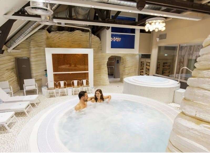 INVESTISSEMENT LOCATIF  CHAMOUILLE  Résidence de tourisme Center Parcs Le Lac d'Ailette - 6.52% de rentabilité - photo 11