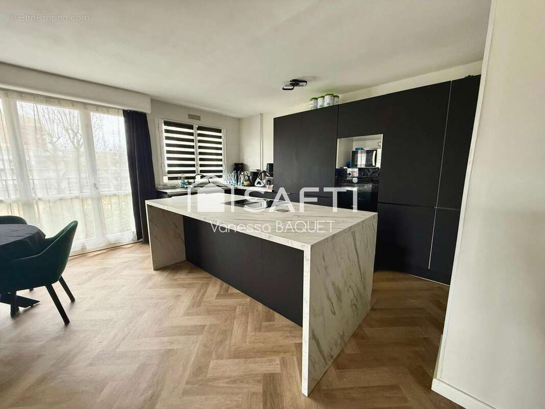 Photo 3 - Appartement à LE PLESSIS-BOUCHARD