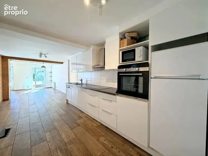 Rare à Saint-Julien-en-Genevois — Rez-de-terrasse d'exception de 102 m² (T3) - photo 3