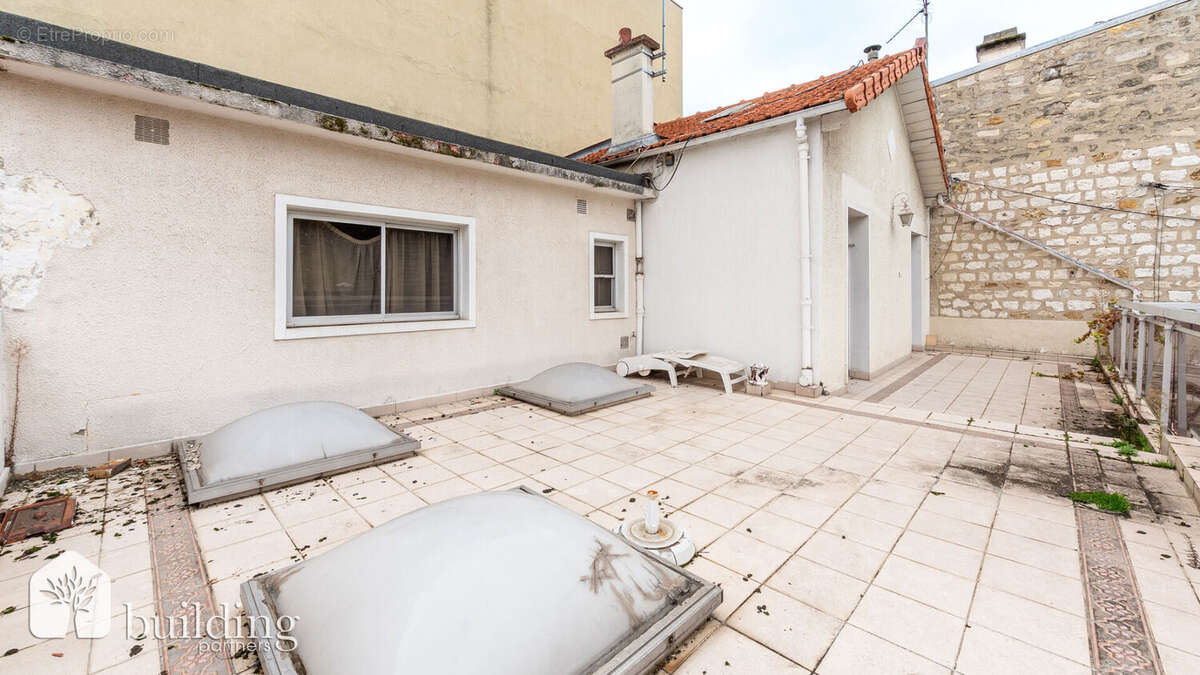 Maison à COURBEVOIE