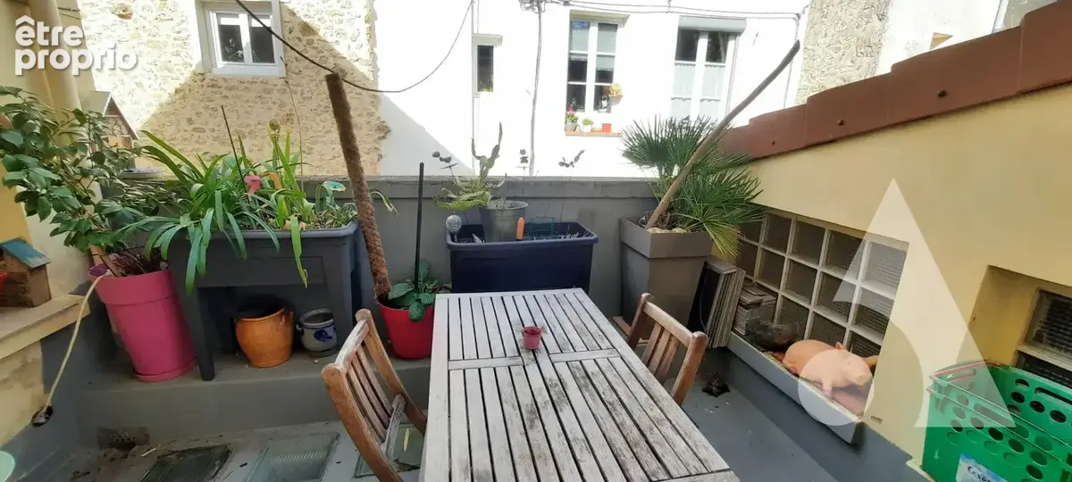 Ensemble immobilier comprenant un appartement de 118 m² avec terrasse et garage + un local commercial de 44 m² - photo 8