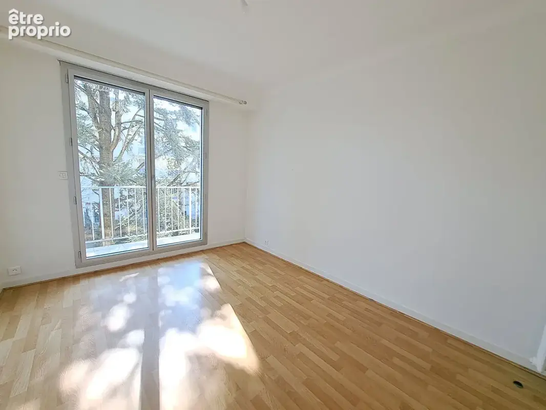 Spacieux appartement T4 de 100,97 m² avec balcon, cave et parking - photo 8