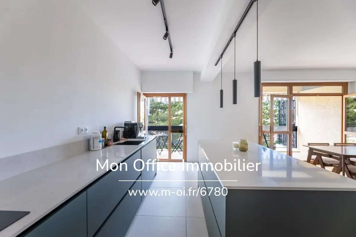 Référence : 6780-ABO - Charmant appartement T3 rénové avec terrasses, parking et cave - photo 4