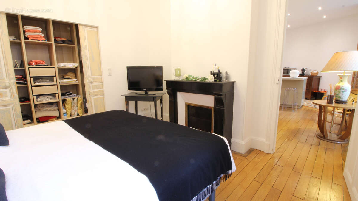 Bel appartement T2 avec ascenseur en centre-ville de Vichy avec cave et mansarde - photo 13