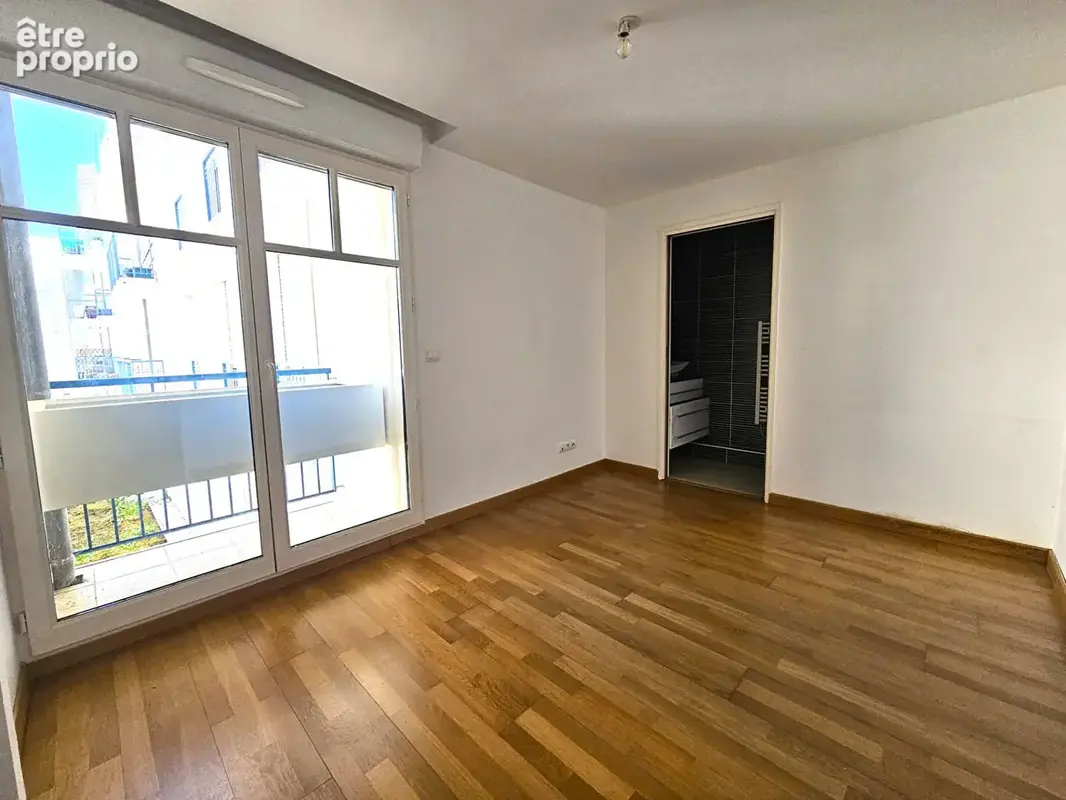 Appartement T3 traversant 73,15 m² avec parking en sous-sol - photo 7