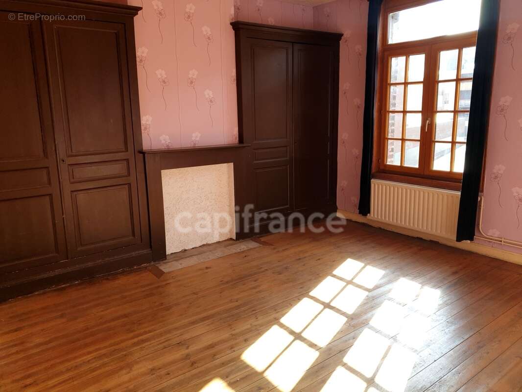 Maison de 1930 pleine de charme avec jardin, terrasse couverte et 4 chambres à Valenciennes (59) - photo 18