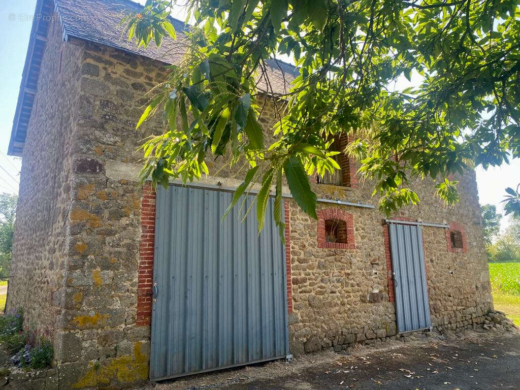 Maison à JUVIGNE