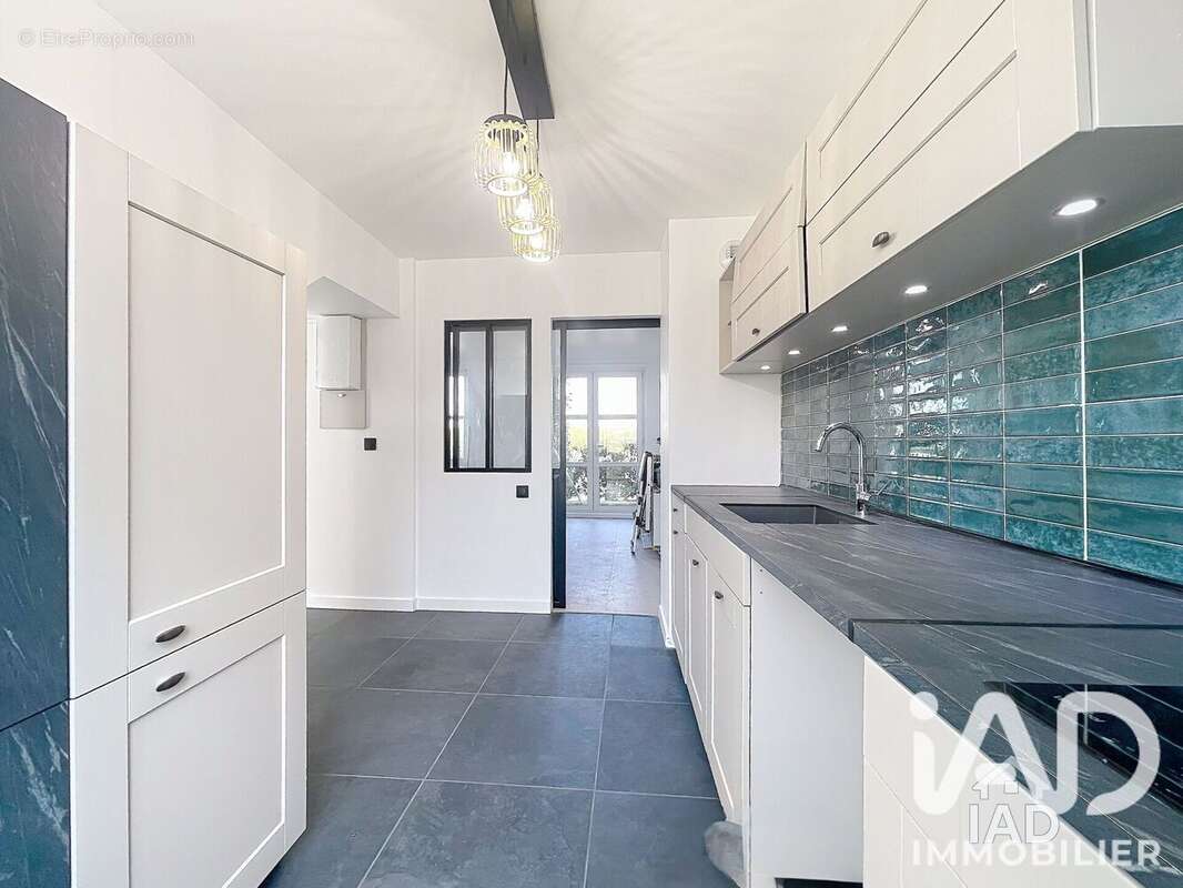 Appartement 80 m² à Voisins-Le-Bretonneux  - photo 6